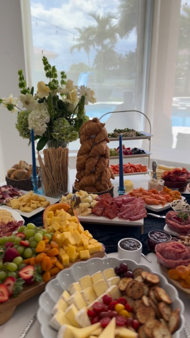 Dessert tables with rhythm, height and a clear celebration mood. primary visual